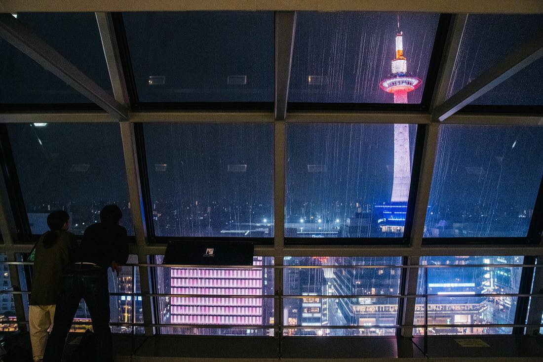 The Kyoto station district and Kyoto Tower lit at night